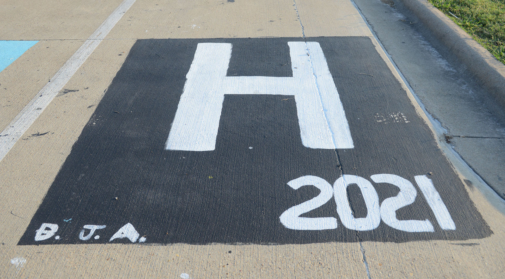 A&M Consolidated HS painted parking spots
